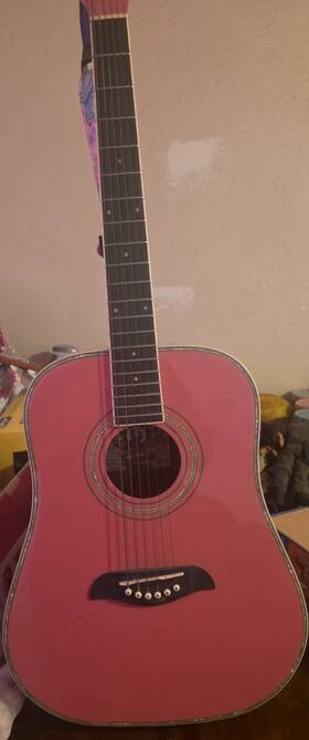 Oscar Schmidt 574511 Pink By Washburn Acoustic Guitar In Good Used Condition. With Case