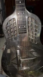 National Tricone Acoustic Resonator Guitar Tri-cone German Silver Body. Fixed Price $4000.00.