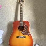 Epiphone Hummingbird Sunburst Guitar 6 String Spruce Mahogany. Fixed Price $750.00.