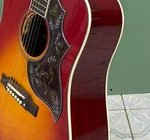 Sunburst Acoustic Guitar 6 String Solid Spruce Top Flower Inlay Pickguard. Fixed Price $308.00.