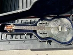 Rare 2002 National Resophonic Round Neck Guitar Model Etched. Fixed Price $3000.00.