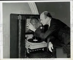 Press Photo Music Critic Deems Taylor Listens Record On Crosley System. Fixed Price $33.99.