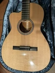 Martin Guitar Acoustic 000C12-16E Left Handed Nylon. Fixed Price $1395.00.