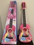 Walt Disney Princess Pink First Act Acoustic Guitar Lebel 3 Includes All Strings. Fixed Price $19.99.