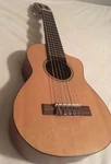 Excellent Cordoba Guilele Acoustic-electric Classical Guitar, Solid Cedar Top. Fixed Price $400.00.