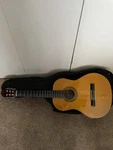 Great Shape Washburn Acoustic Guitar With Brand New Strings. Fixed Price $70.00.