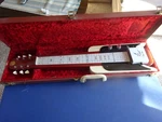 1957 National Steel Hawaiian Guitar Rocket 110 With Case. Fixed Price $899.99.