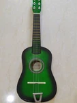Kids Mini Green Guitar Toy Musical Acoustic Instrument Wood Beginner Gift. Fixed Price $29.99.