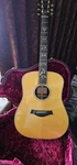 Taylor 910E 1999 Acoustic Guitar, Cindy Inlay, Spruce Top, Rosewood Back & Sides. Fixed Price $3727.00.