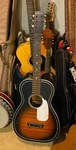 1963 Silvertone H7026 Parlor Guitar. Fixed Price $110.00.