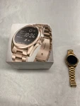 Michael Kors MKT5001 Smartwatch Gold Women's Quartz 42MM Used Needs Charger. Fixed Price $99.00.