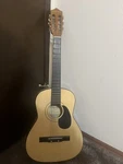 T. A. Lawerance Used Acoustic Guitar. Fixed Price $50.00.