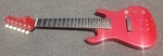 1980'S Synsonics Mini Electric Guitar W/built-in Speaker. Fixed Price $45.00.