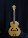 Vintage Harmony H1214 - Archtone Acoustic Archtop Blonde Ivory, Faux Flame. Fixed Price $500.00.