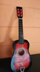 Fun Factory Acoustic Toy Guitar 23 Inches Red Color. Fixed Price $25.00.