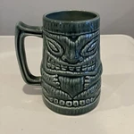 Large Green Tiki Stein Mug Hawaiian Ceramic Fender Guitar California Hula Lounge. Fixed Price $105.99.