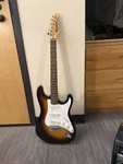 Squier Strat Electric Guitar + Fender Frontman 20G Amp & Cable Great Condition. Fixed Price $275.00.