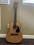 First Act MG394 Acoustic Guitar - Natural. Fixed Price $200.00.