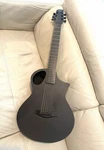 Composite Acoustics The Cargo Carbon Fiber Electric Travel Guitar Raw. Fixed Price $1399.00.