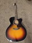 Takamine GJ72CE Jumbo Cutaway A/e Guitar - Brown Sunburst Open Box. Fixed Price $395.00.