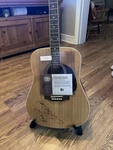 Box Guitar , RA110D-NA. Signed By Jimmy Buffett. Color Tan.. Fixed Price $1800.00.