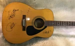 Guitar Signed By Willie Nelson, Pam Tillis The Gibson Miller Band. Fixed Price $700.00.