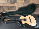 2012 Martin 000C Nylon String Electric Acoustic Guitar W/ohsc. Fixed Price $1275.99.