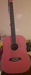 Pink Oscar Schmidt By Washburn Acoustic Guitar Good Used Condition. With Case. Fixed Price $130.00.