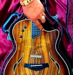 Taylor T5C2 2013 Glossy/ Custom Super Twisty Curly Koa- Mint Hollow Body. Fixed Price $4300.00.