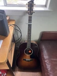 Taylor 20 Anniversary Dreadnought Acoustic Guitar 6 String. Fixed Price $900.00.