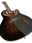 Acoustic/electric Guitar Ovat. Style 12 String Flamed Round Back With Eq. Fixed Price $213.75.