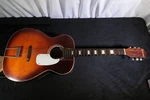 Silvertone Vintage Acoustic Guitar Model H615 Witch Carrying Case, Needs Repairs. Fixed Price $300.00.